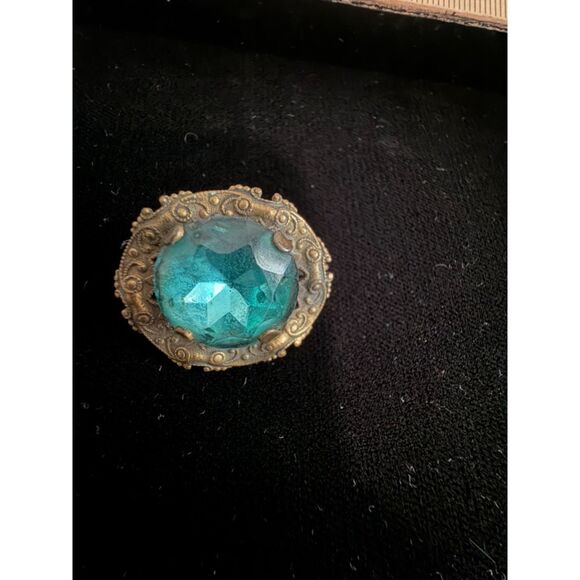 Pair of vintage blue stone with gold metal filigree settings
